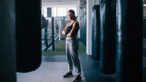 punching bag types, how to choose a punching bag, a woman with punching bags